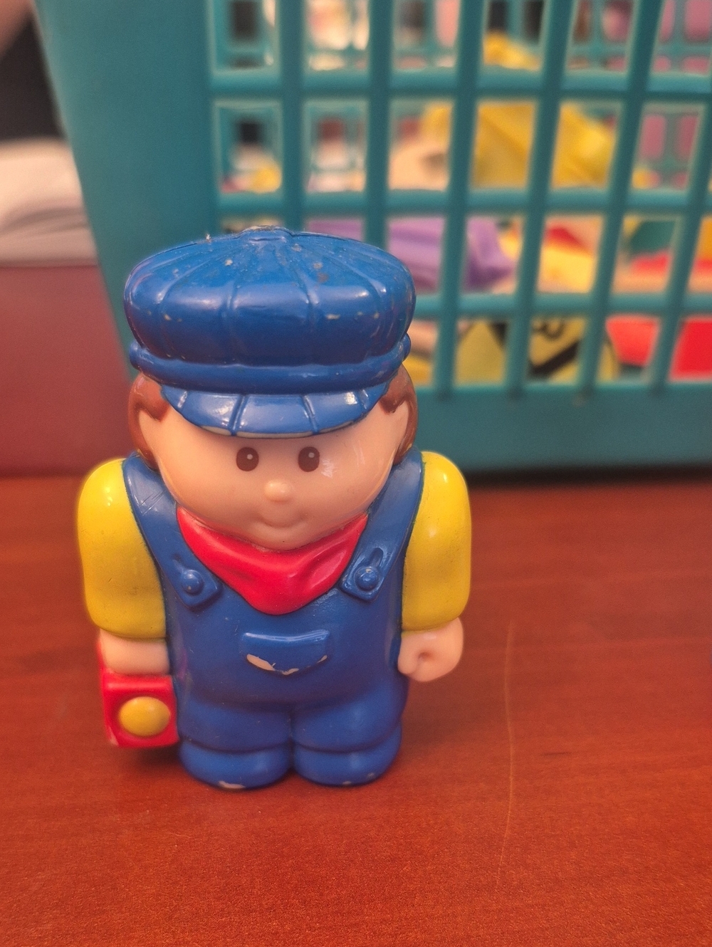 Blue Conductor Play Figure with Yellow Sleeves and Red Scarf